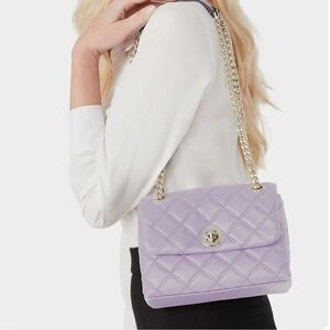 Kate spade med fip shldr💜
lilac fros (500) US2
natalia